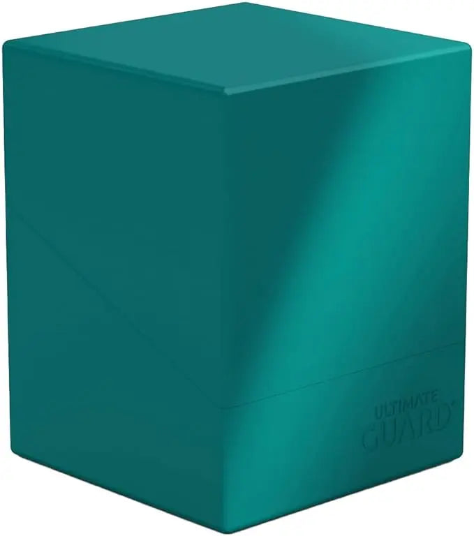 Teal card storage box with 'Ultimate Guard' branding on a white background
